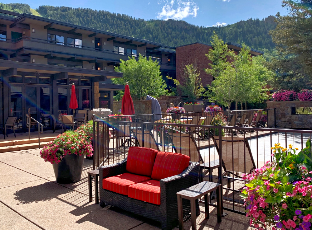 Exterior patio at Aspen Square in the summer
