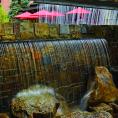 Exterior water feature at Aspen Square in the summer