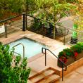 Exterior pool of Aspen Square in the summer