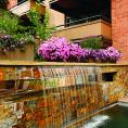 Water feature at Aspen Square in the summer