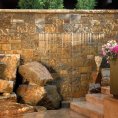 Exterior water feature at Aspen Square in the summer
