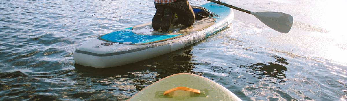 Stand up paddleboarders on a Colorado lake